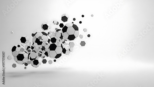 Soccer balls in black and white arranged in a dynamic composition against the light background, suggesting movement and energy. This photo's color creates a classic and sporty image. 