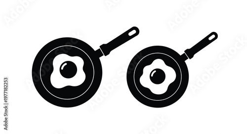 Two black and white illustrations of frying pans with fried eggs inside