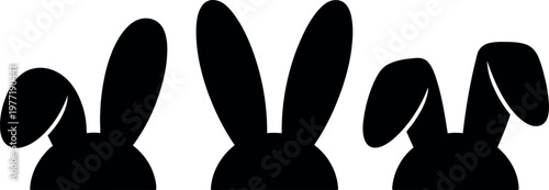 Three stylized bunny silhouettes standing in a row with floppy ears