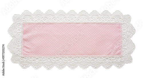 Pink polka dot rectangular doily with white lace trim.