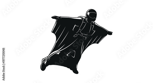 A wingsuit flyer soars through the air in dramatic silhouette