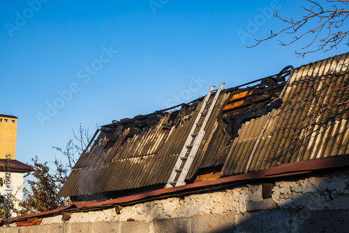 Fire damaged home reveals loss and destruction to the roof