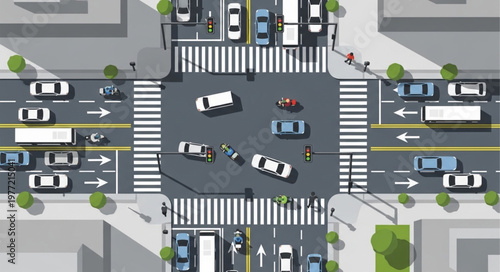 Aerial View of a Busy City Intersection with Cars and Pedestrians.