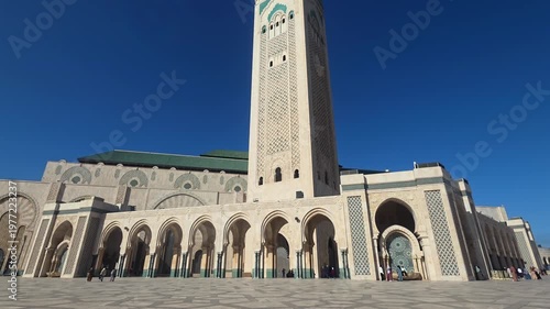 Casablanca, Morocco - 23 March 2026 , Hassan II Mosque street view with traffic, Hassan II Mosque Casablanca Morocco street view traffic road urban landmark