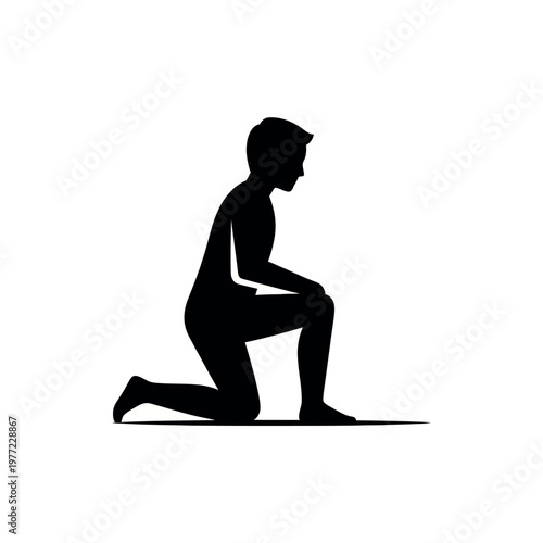 Silhouette of a man kneeling on one knee.