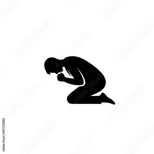 Silhouette of a person kneeling in prayer.