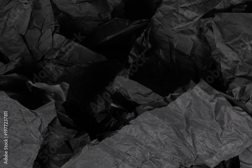 Abstract black paper texture background. Top view.