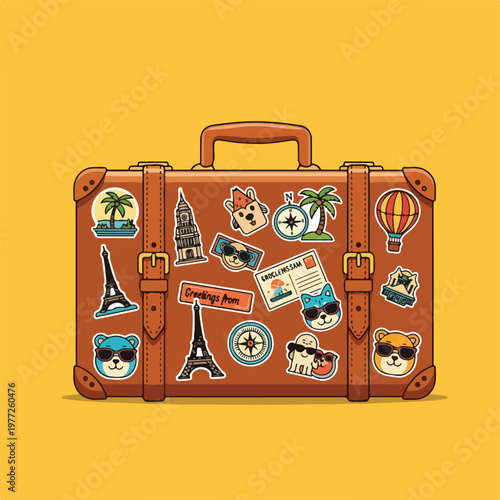 Travel suitcase covered with stickers and travel icons