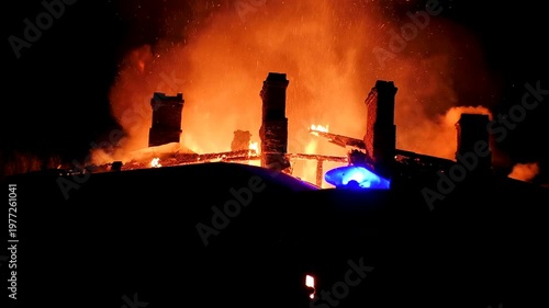 The house is on fire. A scary video of a burning dwelling.
