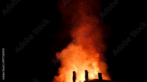 The house is on fire. A scary video of a burning dwelling.