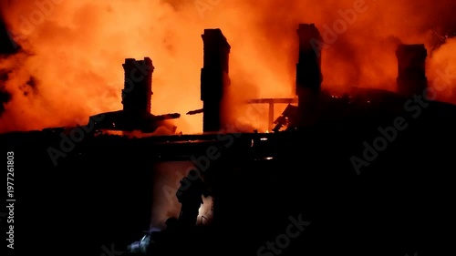 The house is on fire. A scary video of a burning dwelling.
