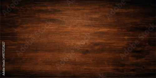 A dark brown grunge background featuring a textured old wooden plank pattern with natural oak grain on a weathered hardwood surface