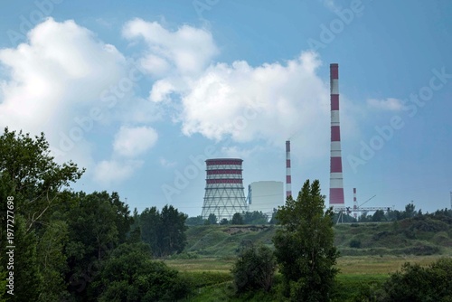 Combined heat and power plant with a chimney and cooling tower. Ecology.