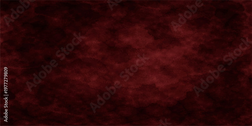 Red grunge abstract background with textured vintage surface and smoky light effects suitable for design backdrop