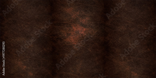 A dark brown vintage leather texture displays an aged and rough surface pattern with a grunge material design suitable for a weathered background or blank backdrop