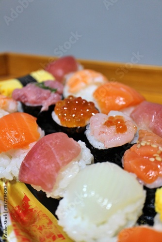 Assorted temari-zushi (ball-shaped sushi) purchased at a supermarket in Tokyo, Japan