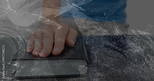 Child hand placing on books, pressing, shifting fingers, holding steady, grain obscuring learning