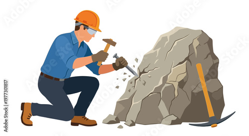 Construction worker chipping away at a large rock with a hammer