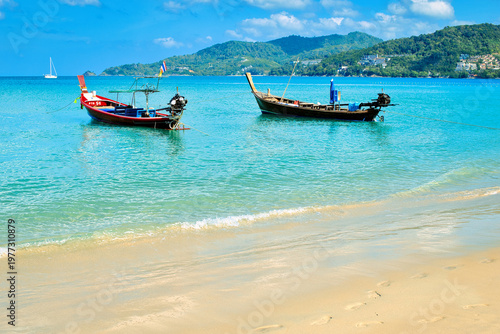 Valokuva Phuket-Patong beach-August 25,2023:The unidentified people are relaxing on Patong beach during a sunny day in Phuket, Thailand