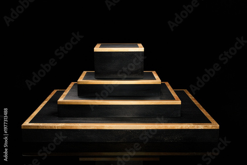 Empty black marble podium with gold line accent in spotlight. Square display stand for product presentation 
