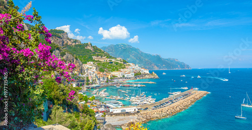 Fotografie Amalfi coast Positano town view with colorful bougainvillea flowers blooming in