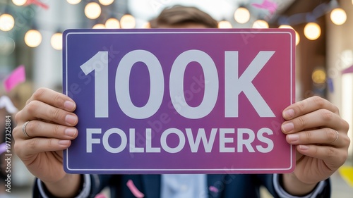 Hands Holding 100K Followers Sign Social Media Milestone Digital Marketing Success Concept Close Up