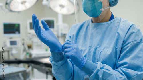 Doctors in Protective Gear Saving Life in Intensive Care Unit