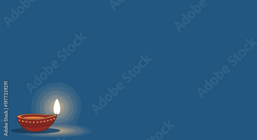 Minimal Diwali oil lamp on blue background with glowing flame, festive Indian diya symbol with copy space, calm spiritual light concept for celebration, culture, and holiday design