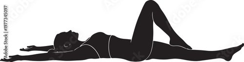 woman in supine twist yoga pose silhouette