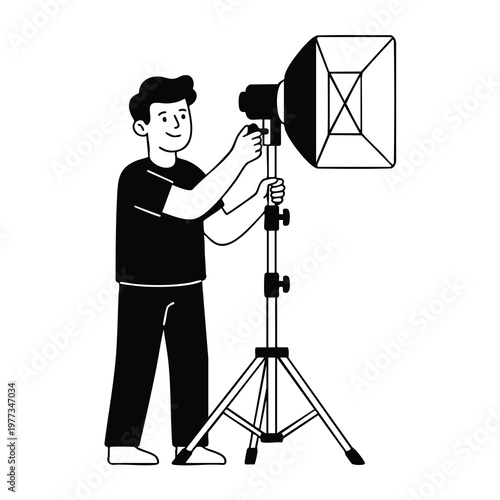 Man Adjusting Studio Lighting Equipment for Photography.