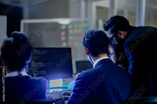 Fotografie Cybersecurity analysts executing threat mitigation protocols in security operations center