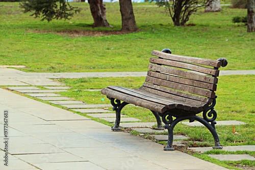 A bench in a park in early spring