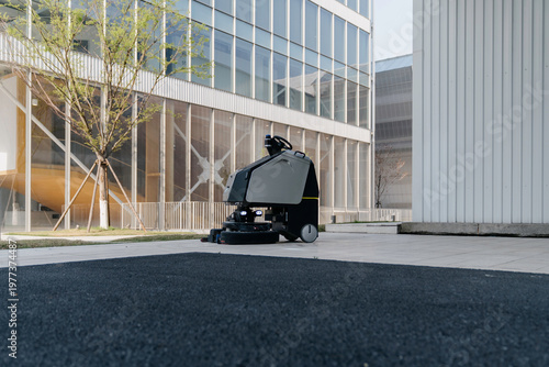 The robot vacuum is working in the mall