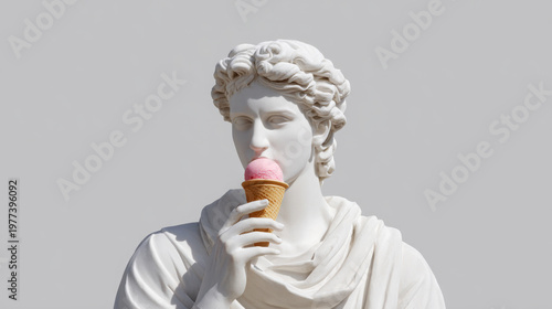 Classical marble statue of a young man holding an ice cream cone with pink ice cream against a plain gray background