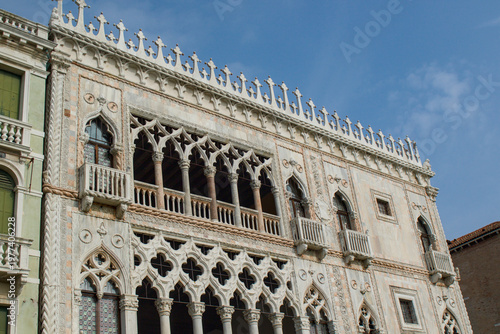 The ornate facade of the Ca' d'Oro showcases the intricate beauty of Venetian Gothic architecture overlooking the Grand Canal.