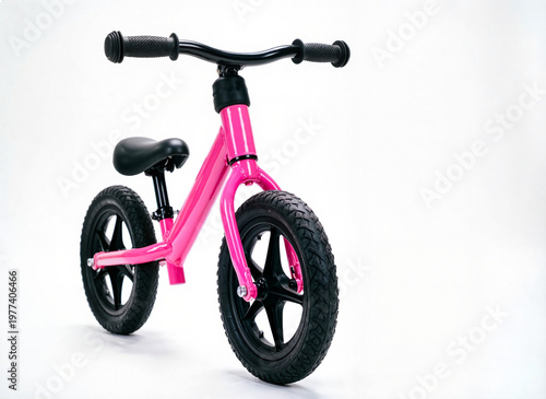 children's plastic balance bike on white