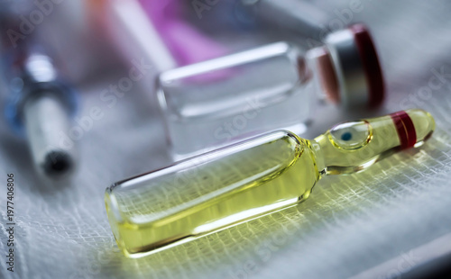 Two vials illuminated laterally, conceptual image