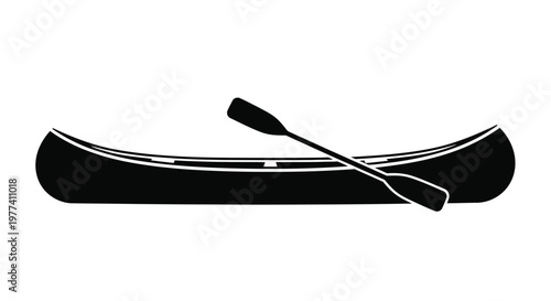Black canoe with a single paddle a striking graphic silhouette