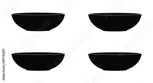 Four black bowls arranged on a white background a stark silhouette