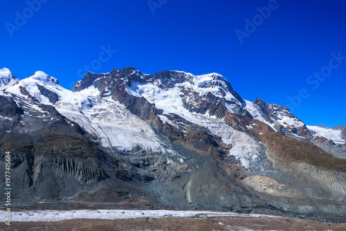 Mountain panorama with summits Castor, Pollux and Breithorn in Pennine Alps, Switzerland