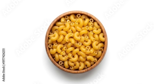 Overhead shot of elbow macaroni pasta in wooden bowl on white background.