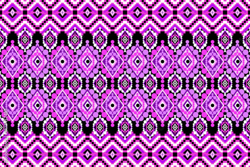 Vibrant seamless geometric pattern with ethnic diamond motifs in neon pink, purple, black, and white. Bold symmetrical design perfect for textiles, fashion, wallpaper, and surface prints.