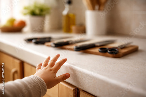 Baby Hand Reaching for Kitchen Counter