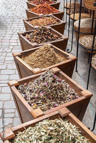 Moroccan street market selling traditional herbs and tea