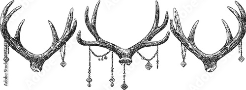 decorative deer antlers with hanging ornaments and geometric charms in vintage
