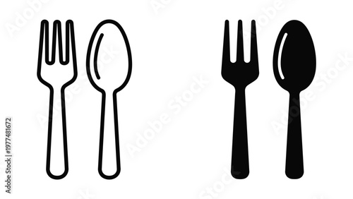 Contrast between light and dark colored cutlery set of fork and spoon