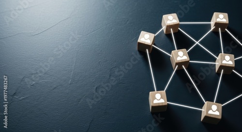 Professional business networking concept, wooden blocks with human icons connected by lines, corporate team structure and social connection on dark background