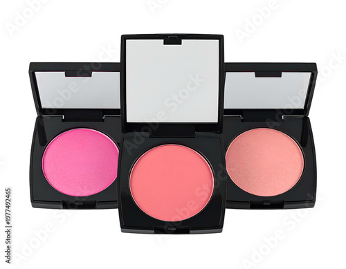 Three compacts of powder blush in shades of pink, coral, and peach