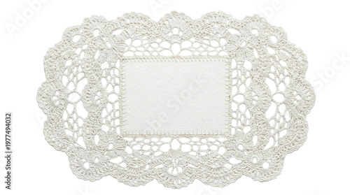 Foto Blank rectangular paper note decorated with an oval white crocheted lace doily f