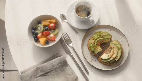 Wallpaper Mural Breakfast table, featuring fruit salad, avocado toast, and a cup of coffee. The food items are artistically arranged with silverware and a napkin. The scene is bright and inviting Torontodigital.ca